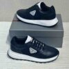 Prada Nubuck and Nylon High-Top Sneakers - Image 3