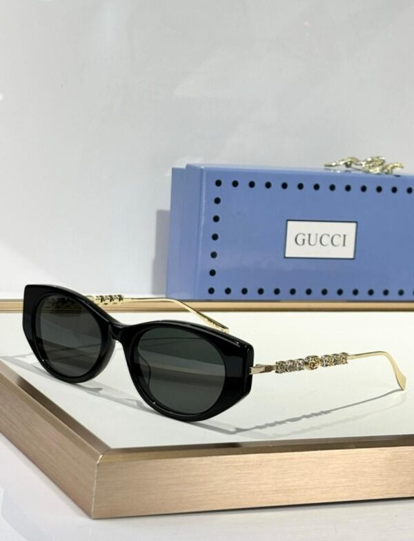 Gucci GG1680S 002 Black and Gold Logo Sunglasses